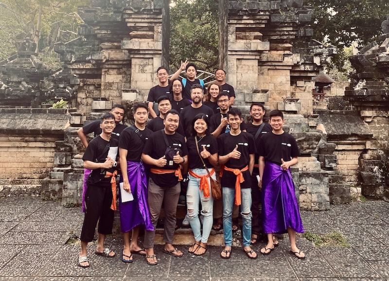 Wolkk team at a Balinese temple during company retreat